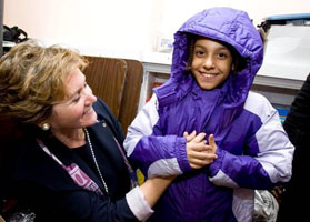 Operation Warm Child recieving coat